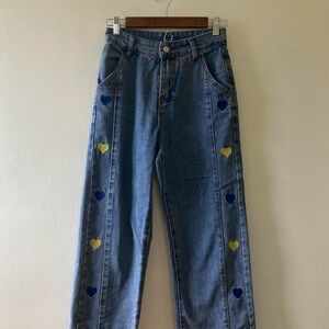 straight leg jeans with heart accents